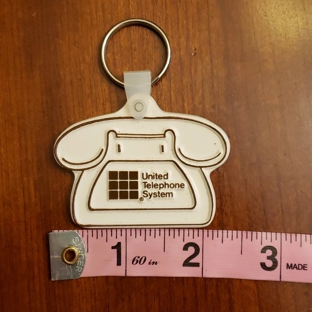 VINTAGE United Telephone Plastic Keychain